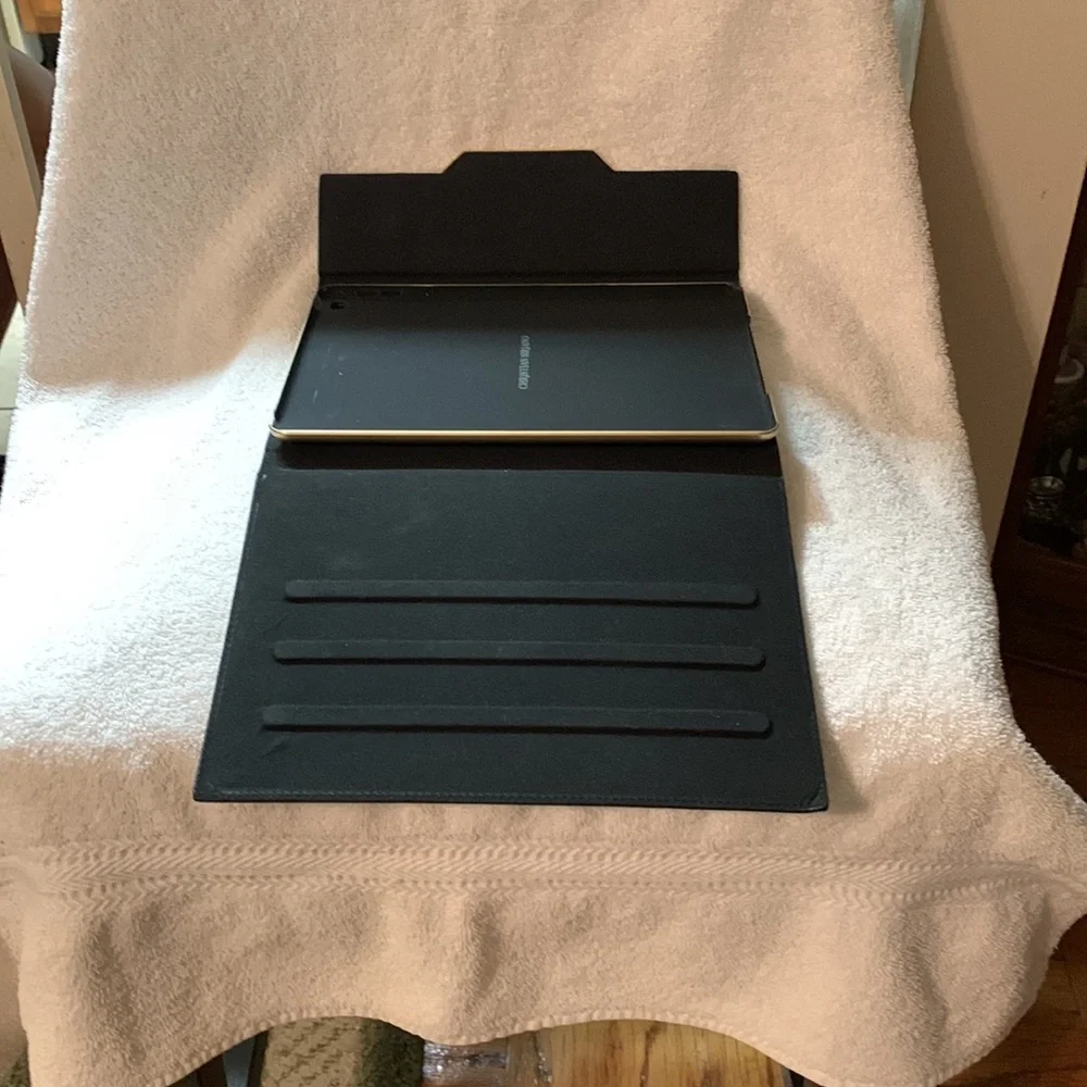 Black Christian Siriano iPad case.